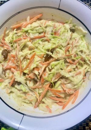 A picture of Coleslaw with raisins.