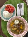Sopa de menudencias con huevo duro
