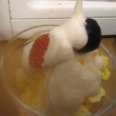 A picture of Lemon yoghurt & lemon meringue with fruit.