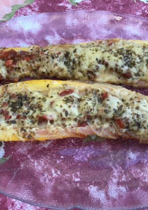 Une photo de Courgette jaune farcie pancetta tomates emmental aux épices et origan (recette plancha)