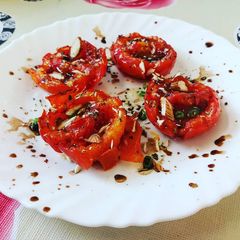 A picture of Grilled Tomatoes with Almond and Herbs (Italy).