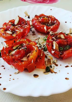 A picture of Grilled Tomatoes with Almond and Herbs (Italy).