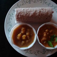 A picture of Puttu, Kadala curry,& chenda murian sweet.
