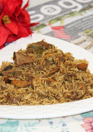 A picture of Kerala Style Squid Biryani.