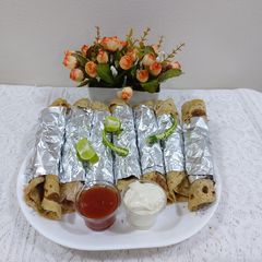 A picture of Chicken tikka rolls.