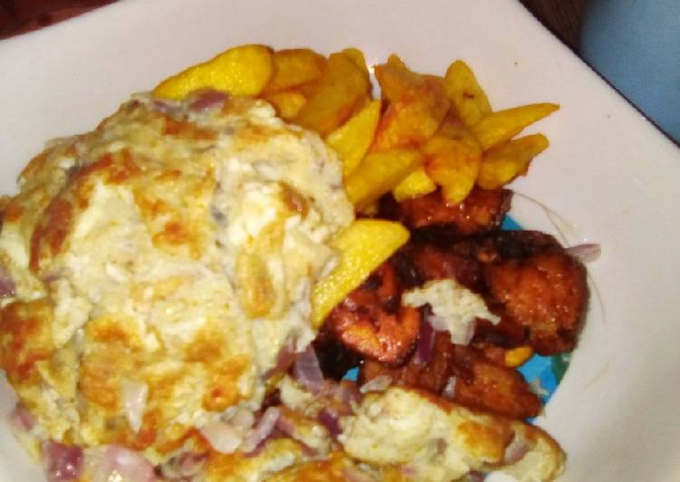 Fried Irish Potatoes and plantain with fried egg