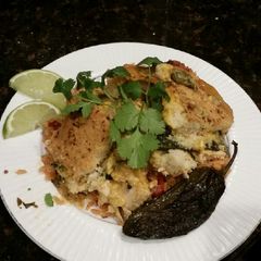 A picture of Brad's Chicken Verde casserole over Spanish rice.