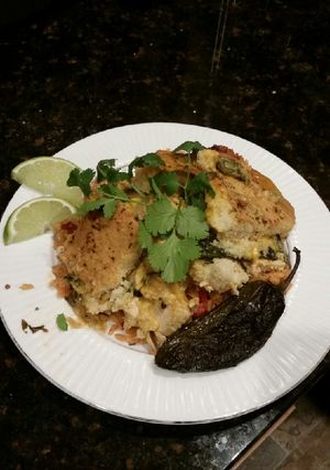 A picture of Brad's Chicken Verde casserole over Spanish rice.