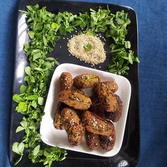 Methi sesame fry muthiya A picture of Methi sesame fry muthiya.