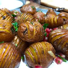 A picture of Hassleback topped potatoes.