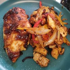 A picture of Teriyaki tofu with cherry tomatoes. Airfyer.