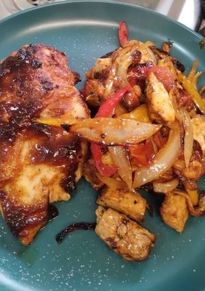 A picture of Teriyaki tofu with cherry tomatoes. Airfyer.