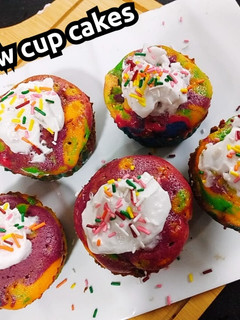 A picture of Rainbow cup cakes.