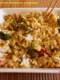 Una foto de Arroz integral con verduras y bacalao