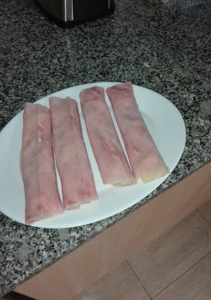 Una foto de Rollitos de jamón dulce