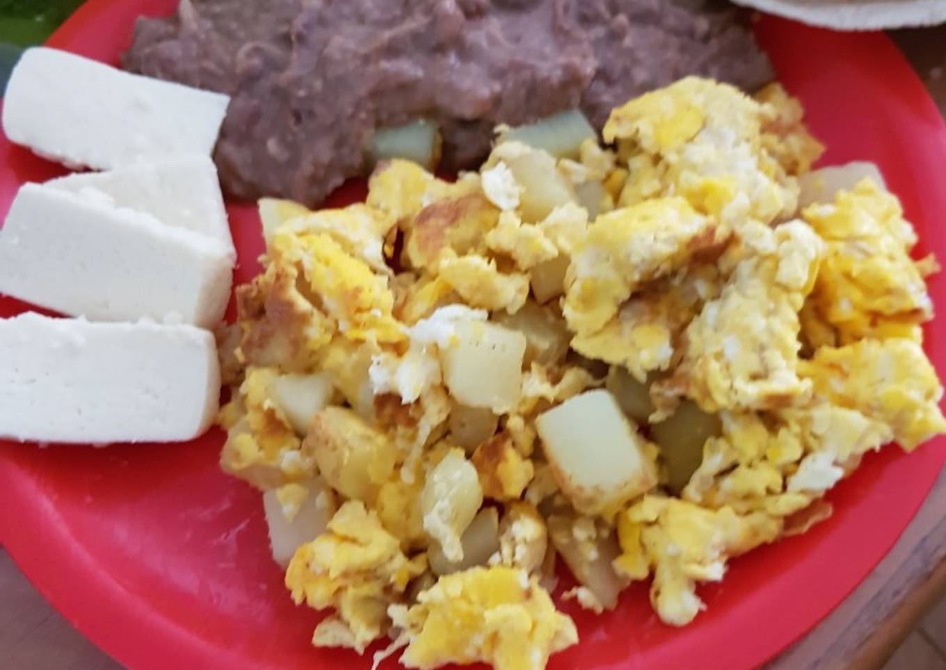 Huevos revueltos con papa