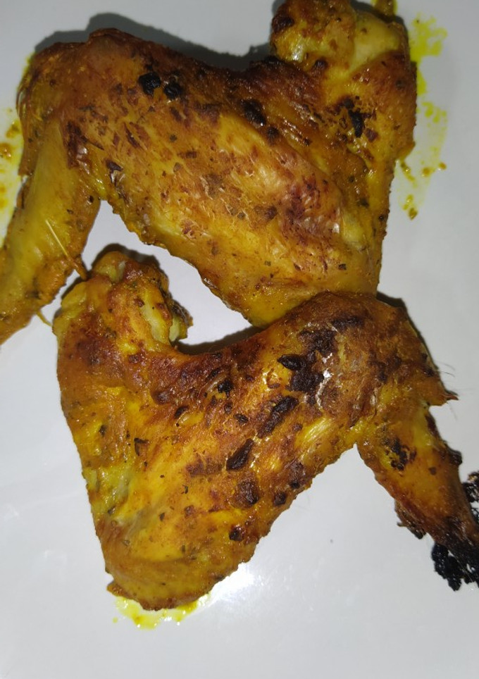 Una foto de Alitas al horno especiadas