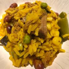 A picture of Leftover Steak with Yellow Rice.