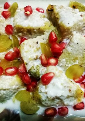 A picture of Curd idli with fruits.