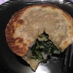 A picture of Dash Mini Pie Maker: Spinach and Feta Mini Pies.