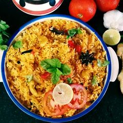 A picture of Tasty Tomato Rice.