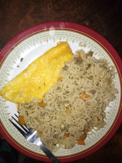 A picture of Special indomie with minced meat and fried egg.