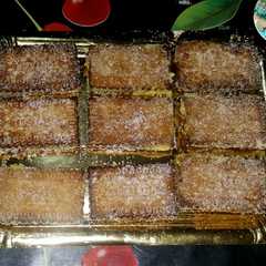 Una foto de Galletas fritas rellenas de crema