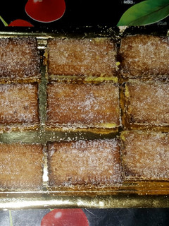 Una foto de Galletas fritas rellenas de crema