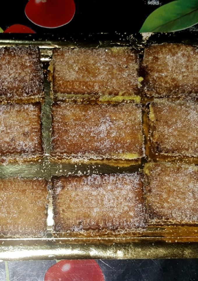 Una foto de Galletas fritas rellenas de crema
