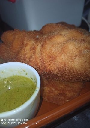 Una foto de Bacalao Frito con Salsa de Frutos Secos
