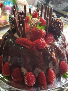 Una foto de Tarta de chocolate con fresas