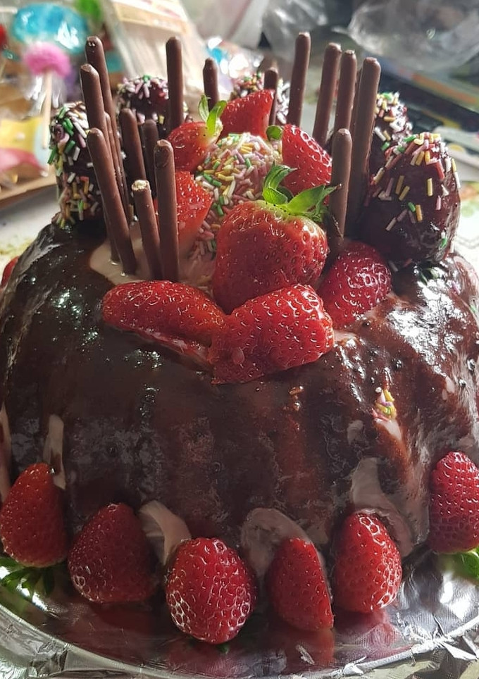 Una foto de Tarta de chocolate con fresas