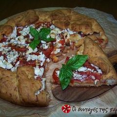 A picture of Amazing tomato pie with cheese dough.