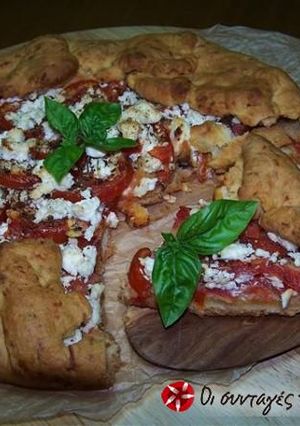 A picture of Amazing tomato pie with cheese dough.