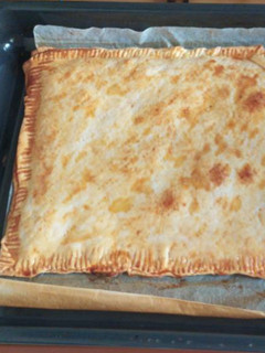 Una foto de Empanada: tomate, atún y huevo