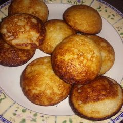 A picture of Making vitumbua vya mchele.