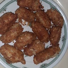 A picture of Crispy egg and potato fingers.