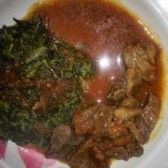 A picture of Beef stew with traditional vegetables.