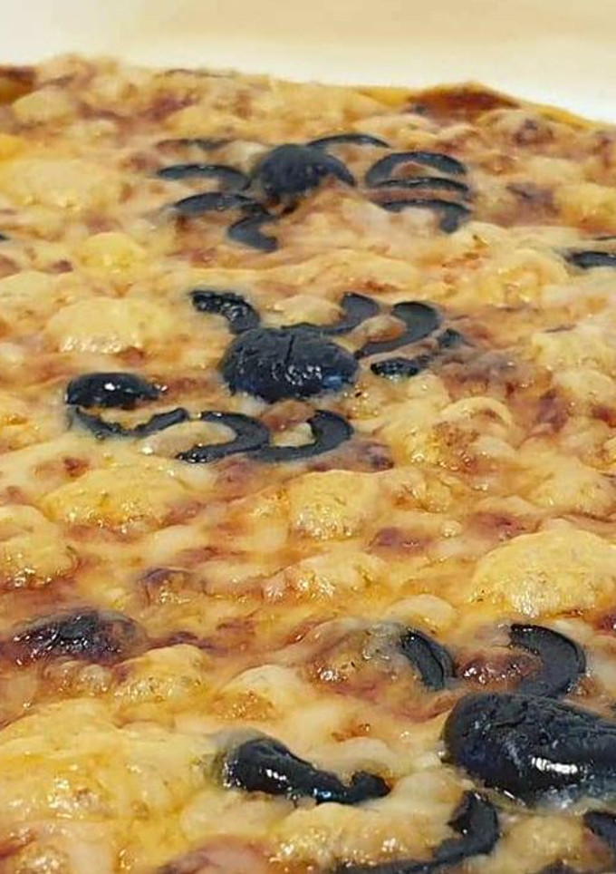 Una foto de Pizza de arañas (Spider pizza)