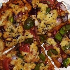 A picture of Pizza in Air Fryer.