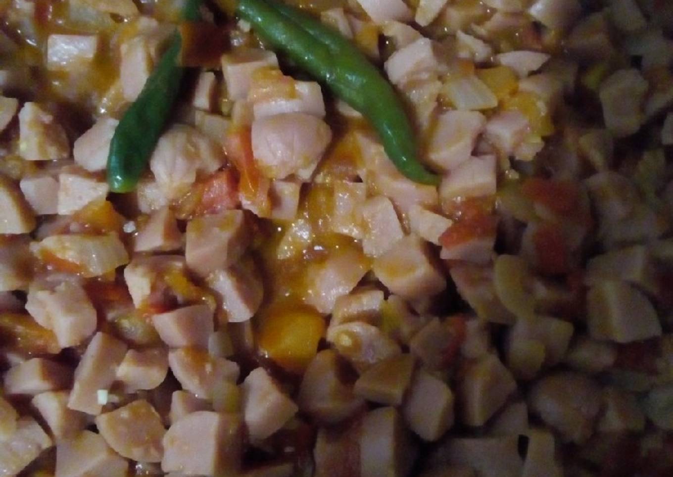 Salchichas entomatadas