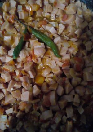 Una foto de Salchichas entomatadas