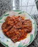 Lengua con salsa