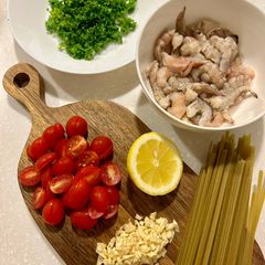 A picture of Spicy Garlic Prawn Pasta with Cherry Tomatoes.