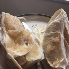 A picture of Gigantic Asian grapefruit breakfast.