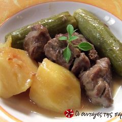 A picture of Beef with zucchini and potatoes.