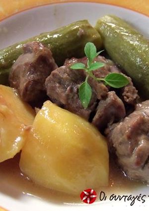 A picture of Beef with zucchini and potatoes.