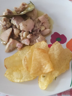 Una foto de Pollo encebollado