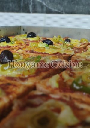 Une photo de Fausses pizza express 🍕🍕😋