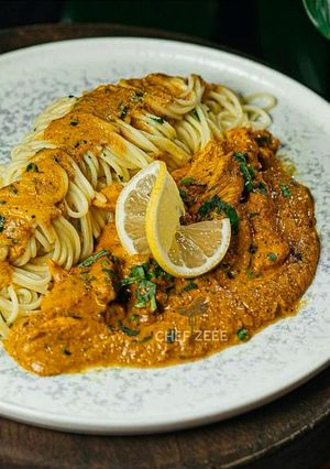 A picture of Butter Noodles with Chicken Strips Curry.